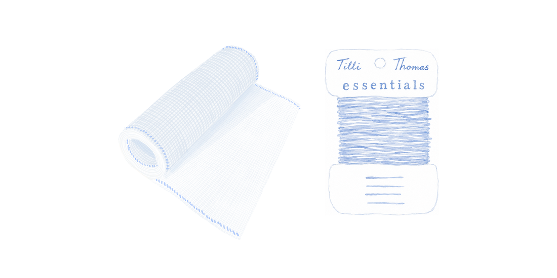 A roll of needlepoint canvas mesh beside a Tilli Tomas Essentials thread card