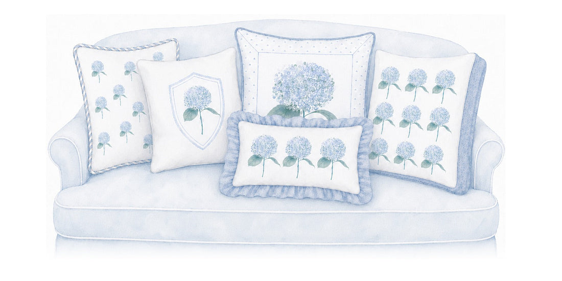 Needlepoint pillows on a sofa, watercolor illustration