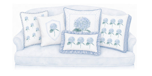 Needlepoint pillows on a sofa, watercolor illustration