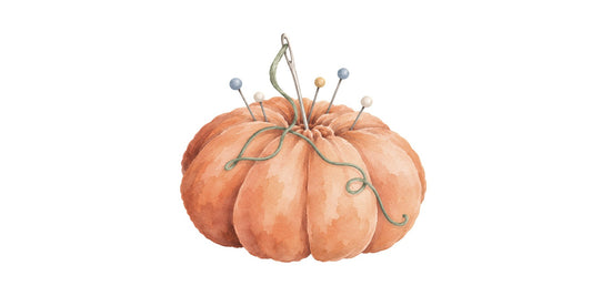 Watercolor pumpkin pincushion with a needle, green thread and pins