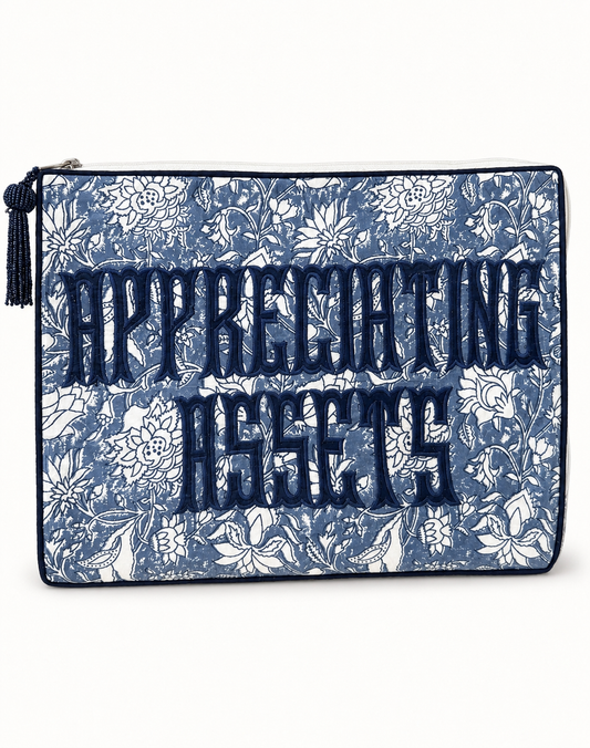 Appreciating Assets embroidered project bag in blue and white floral block print with navy beaded tassel zip pull