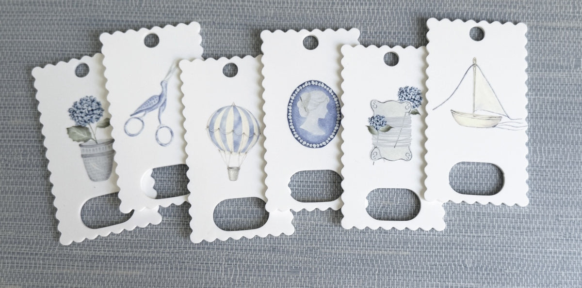 Six illustrated thread drops, each with cut thread looped through its slot